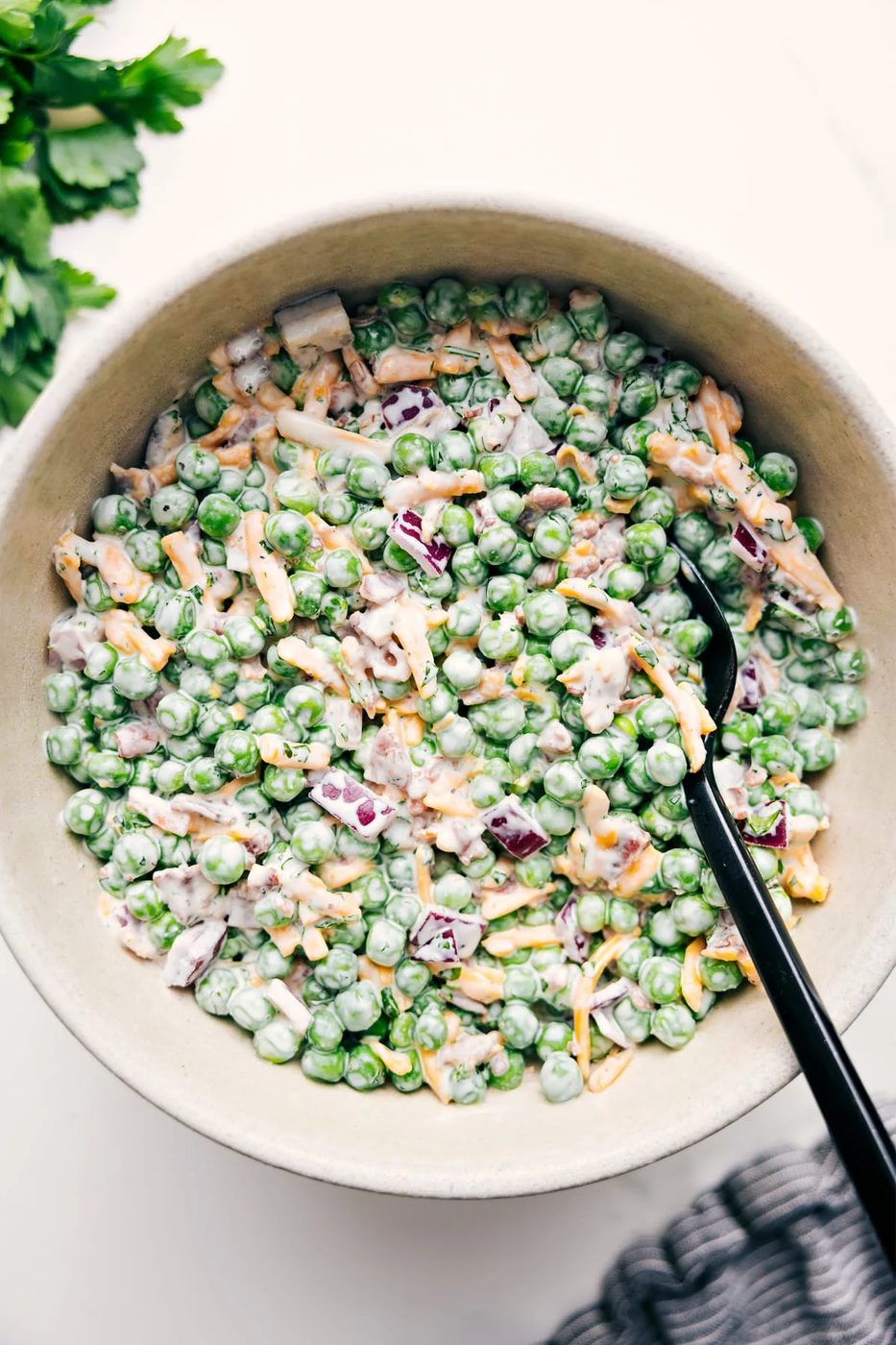 Pea salad recipe in a bowl ready to be enjoyed.