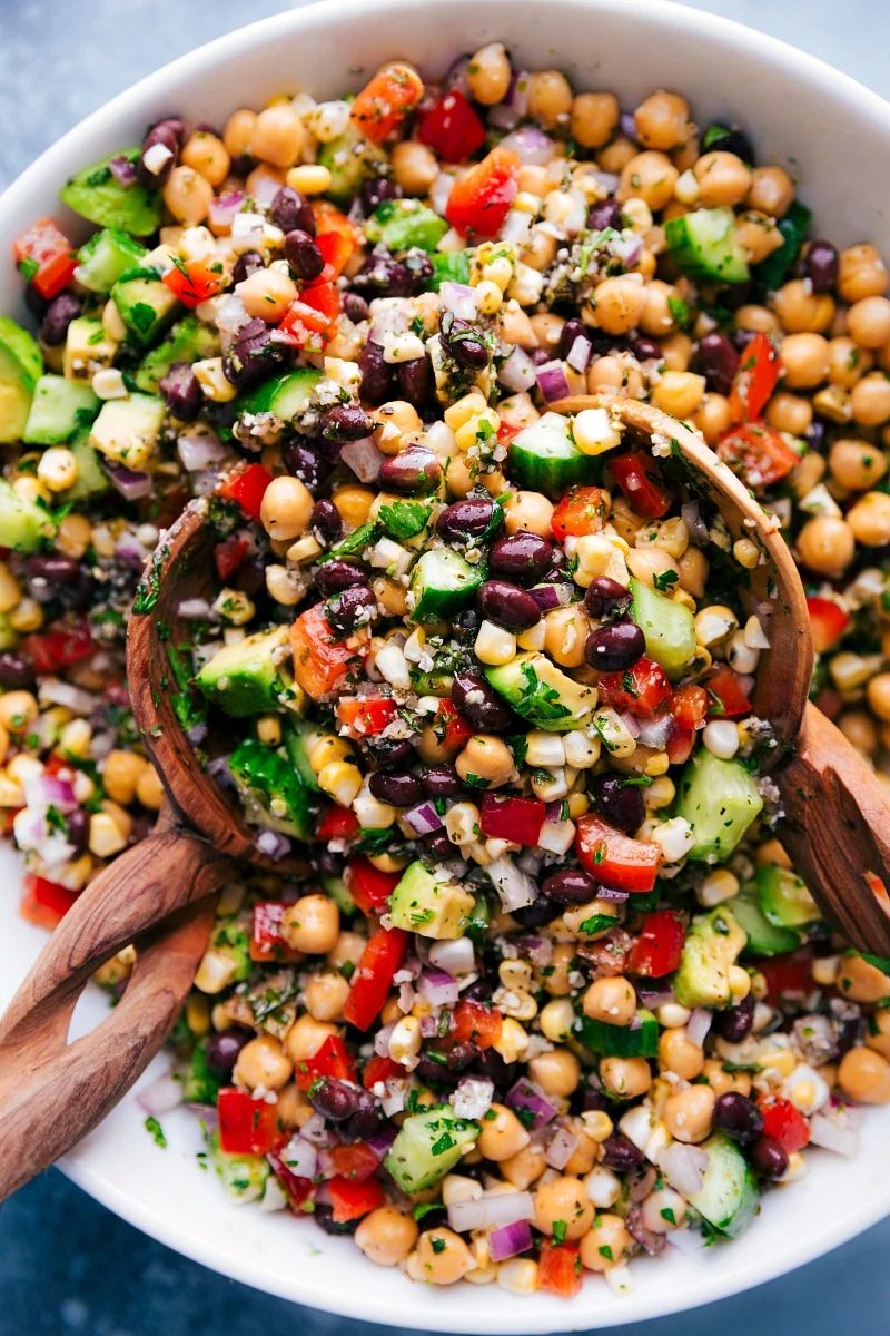 Garbanzo bean salad dressed and tossed together.