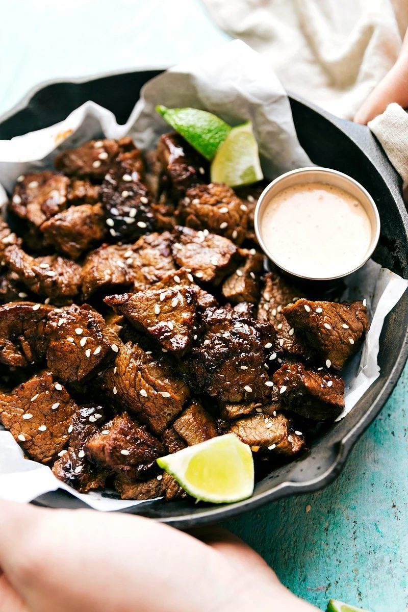 straightforward asian steak bites with a dipping sauce on the side.