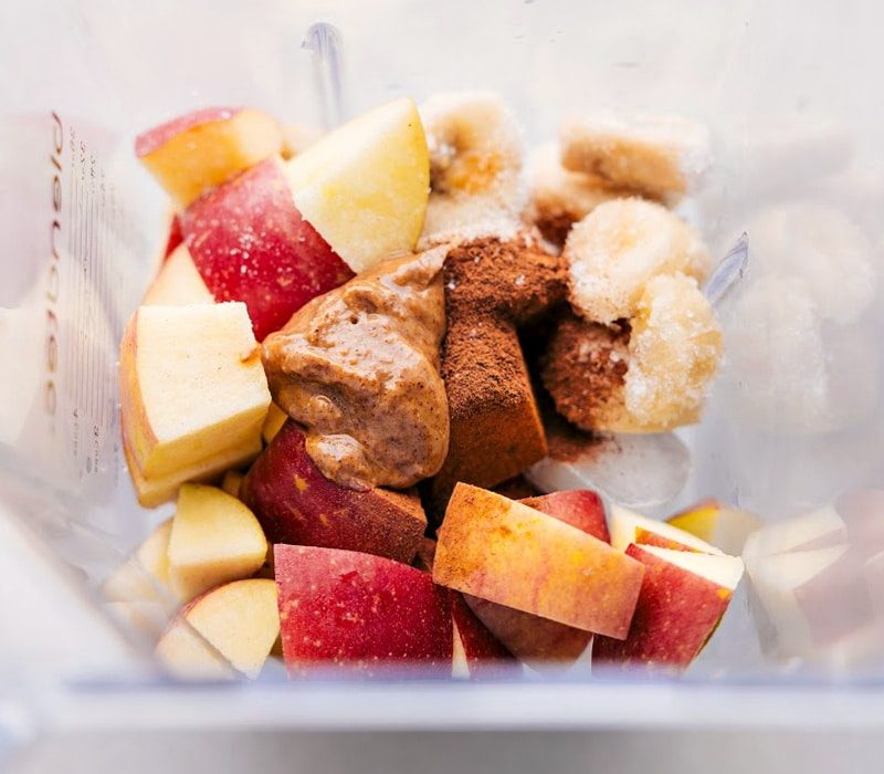 Apples, spices and almond butter going in the blender, ready to be processed.