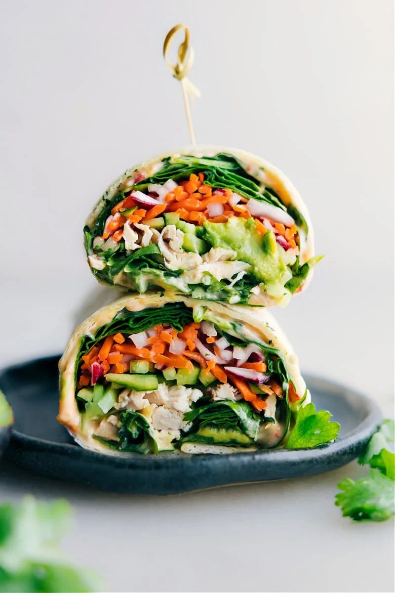 Thai chicken wraps stacked on top of each other.