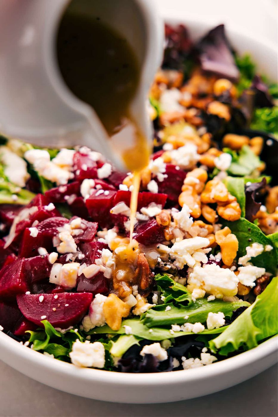 Dress the beet goat cheese walnut salad with the satisfying dressing.