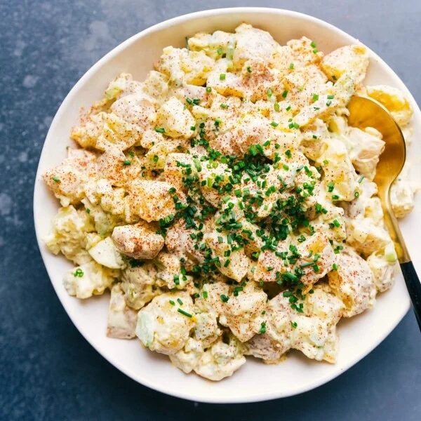 Fully dressed dish coated in a rich, creamy dressing.