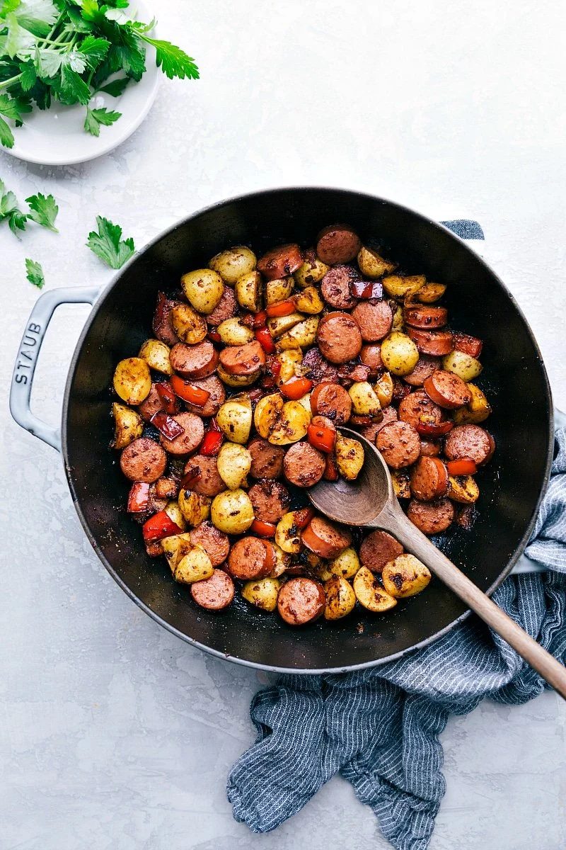 Sausage and potatoes skillet, one of the Best Recipes for Meal Prep, with peppers and herbs.