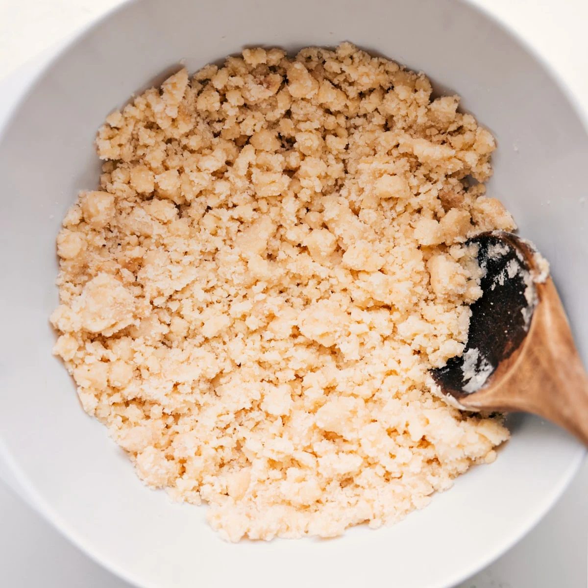 Blueberry cobbler recipe crumble topping in a bowl.