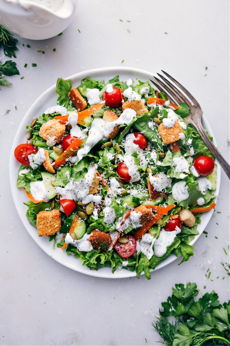 A fully dressed salad ready to be enjoyed.
