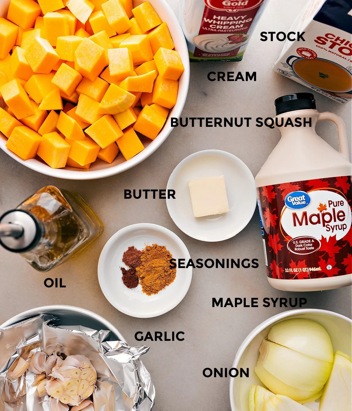 Prep all the ingredients for this recipe, including the veggies, stock, cream, maple syrup, butter, seasoning, and oil, for straightforward assembly.
