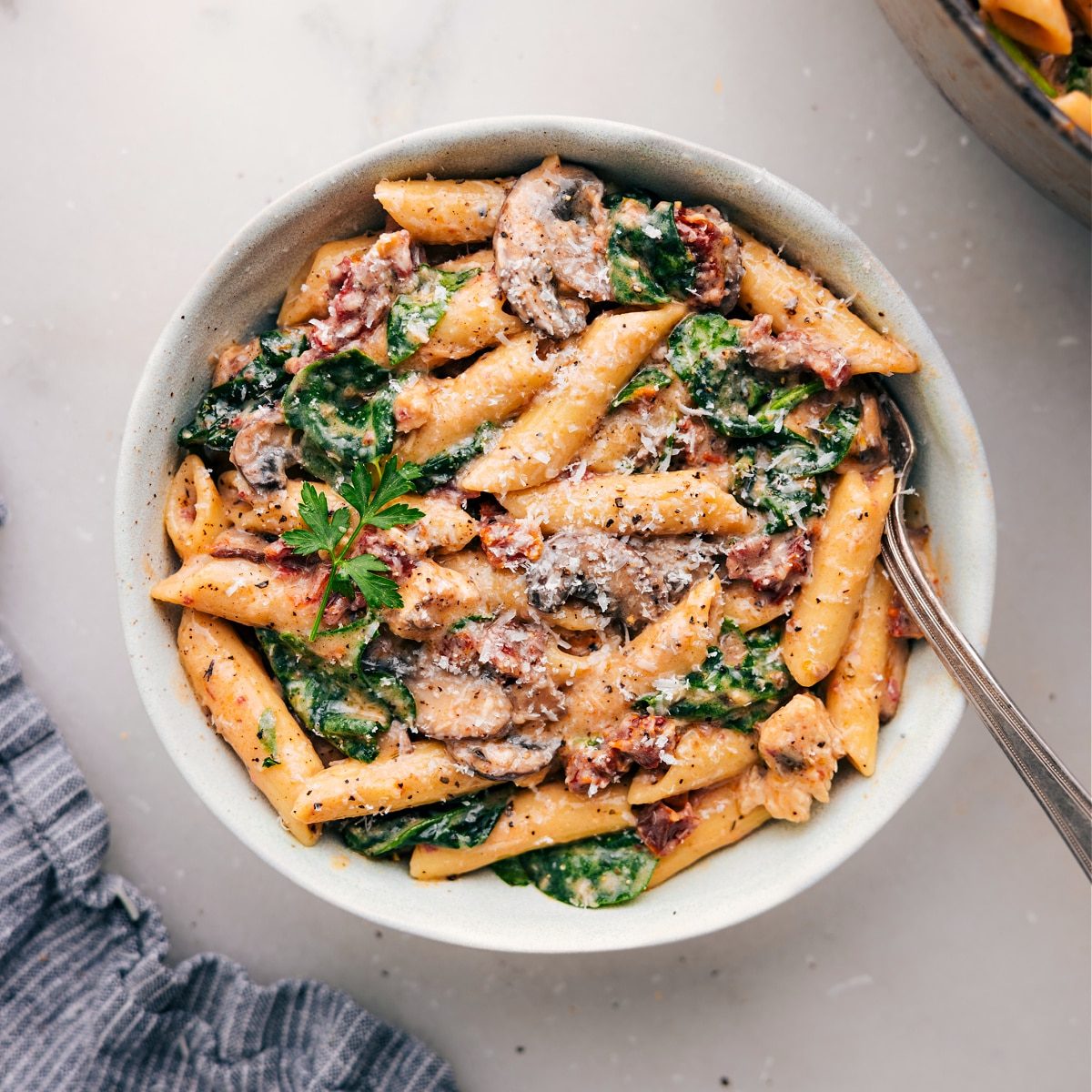 A bowl of satisfying Chicken Penne Pasta, evenly cooked and served warm.