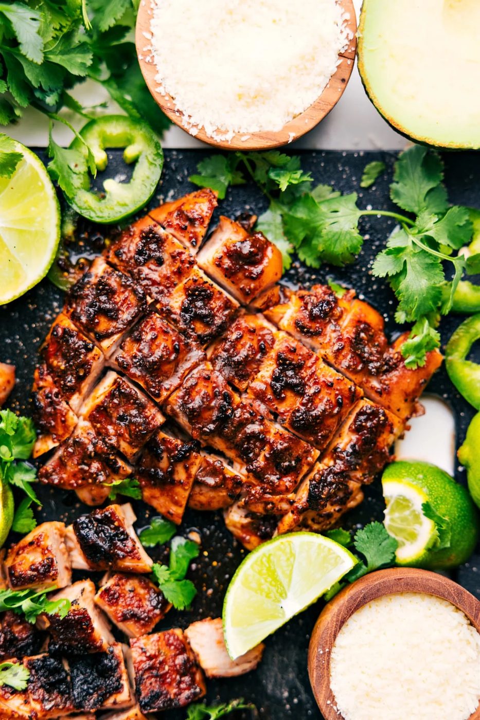 Chipotle Chicken Recipe sliced and served fresh from the oven, showing juicy, seasoned pieces ready to enjoy.