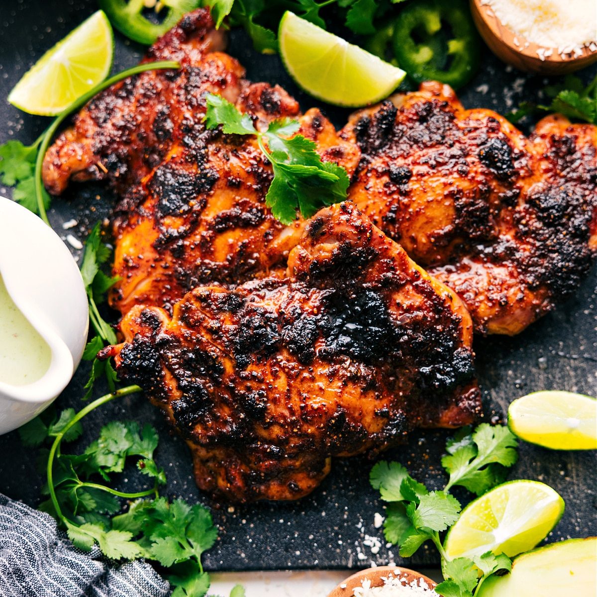 The meat fresh out of the oven with fresh limes, jalapeños, and cilantro to serve with.
