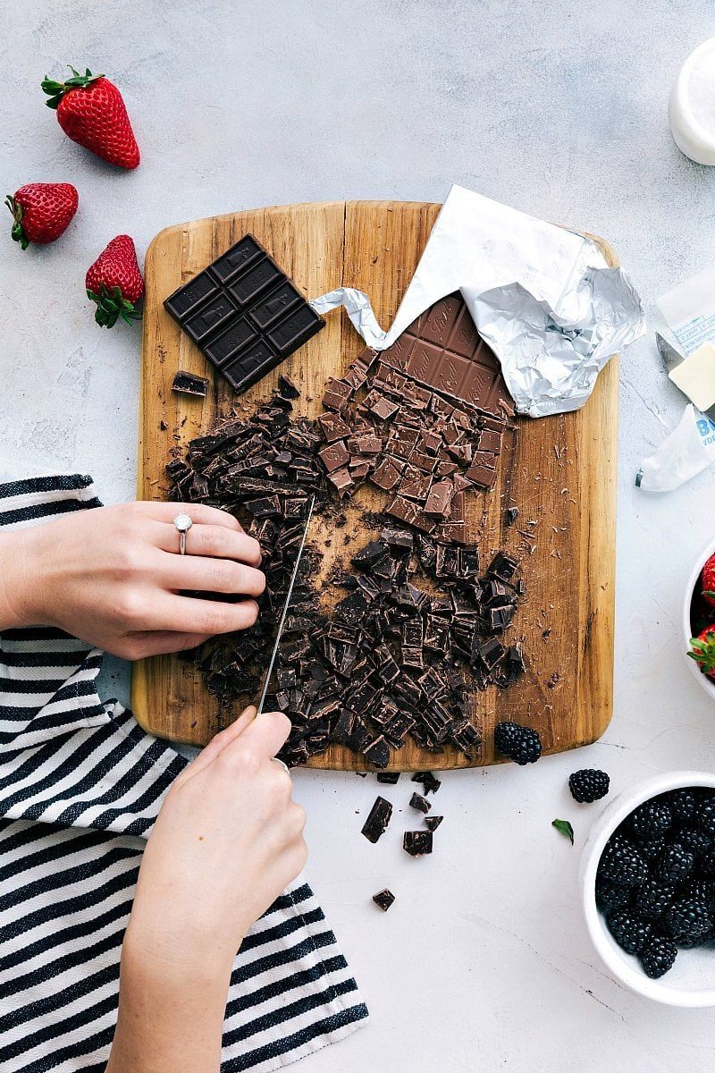 Chop two different kinds of chocolate to add into this recipe.