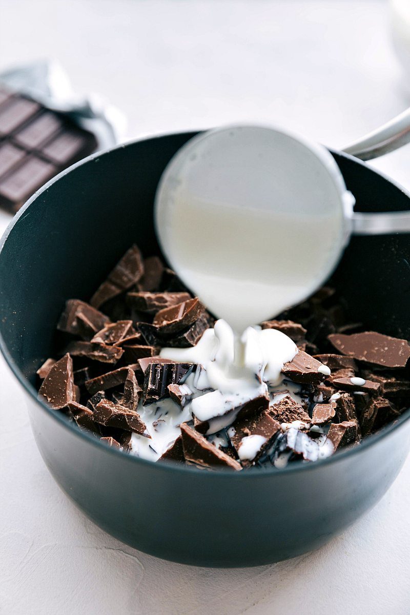 Add heavy cream to the pot.