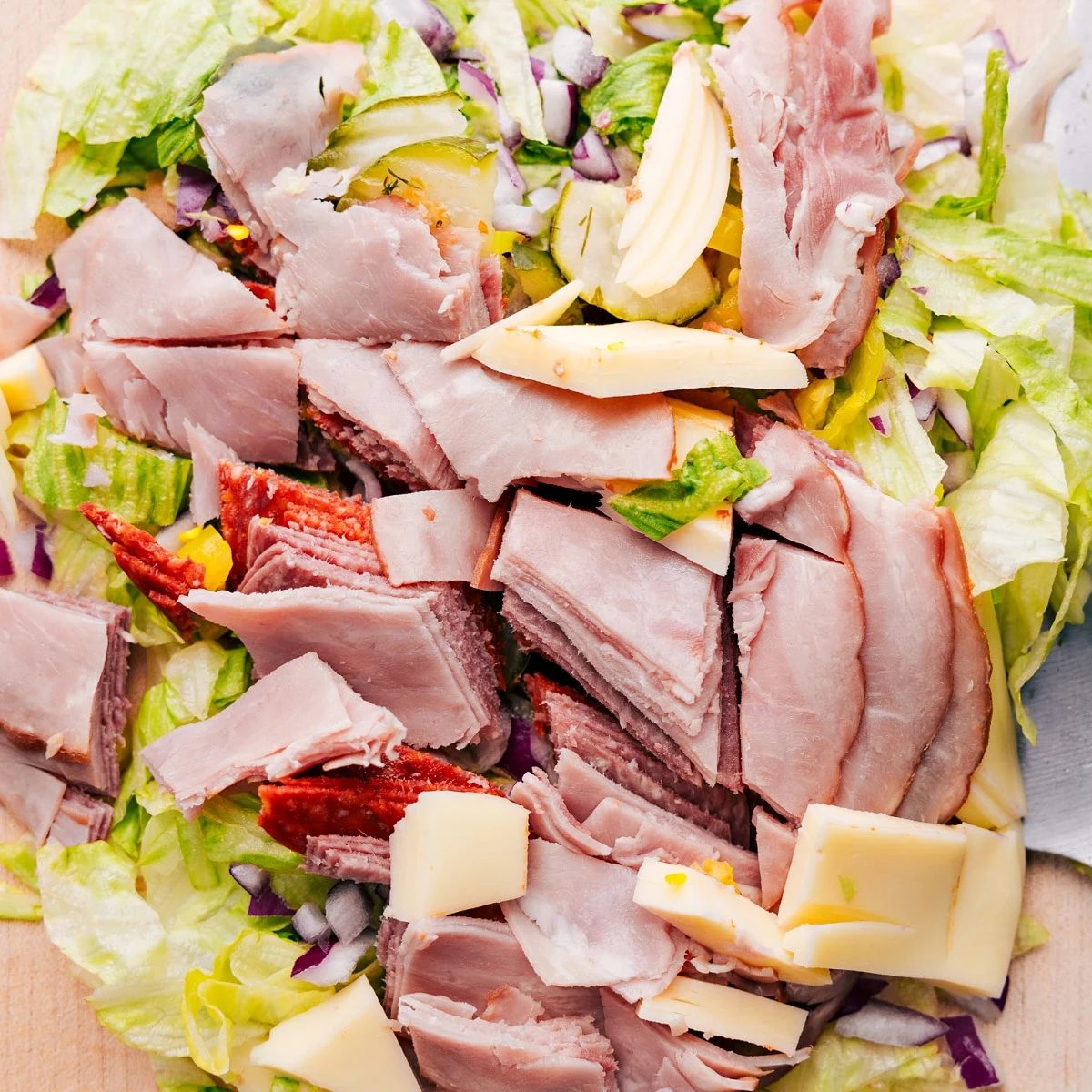 All the filling ingredients for this Chopped Italian Sandwich chopped and mixed together.