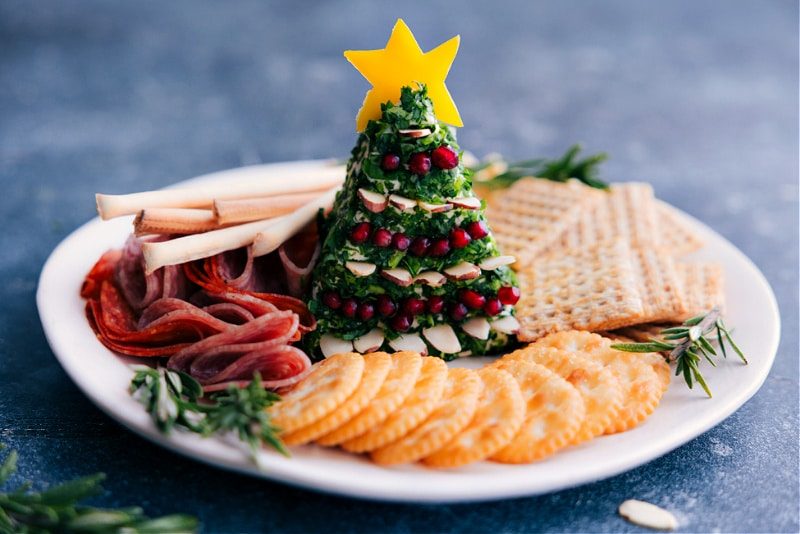 Christmas tree cheese ball snack plate ready to be enjoyed.
