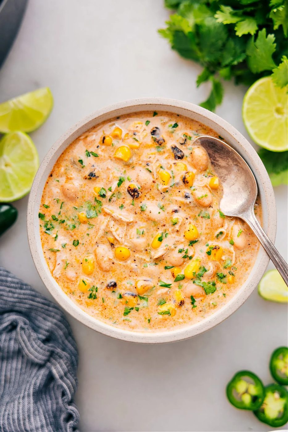 Serve the slow cooker white chicken chili in a bowl, ready to enjoy.