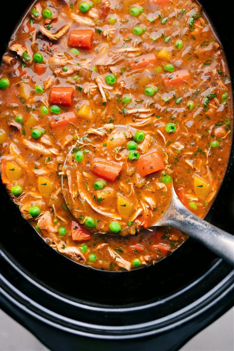 Hearty slow cooker Chicken Stew with tender chicken, vegetables, and a rich, savory broth.