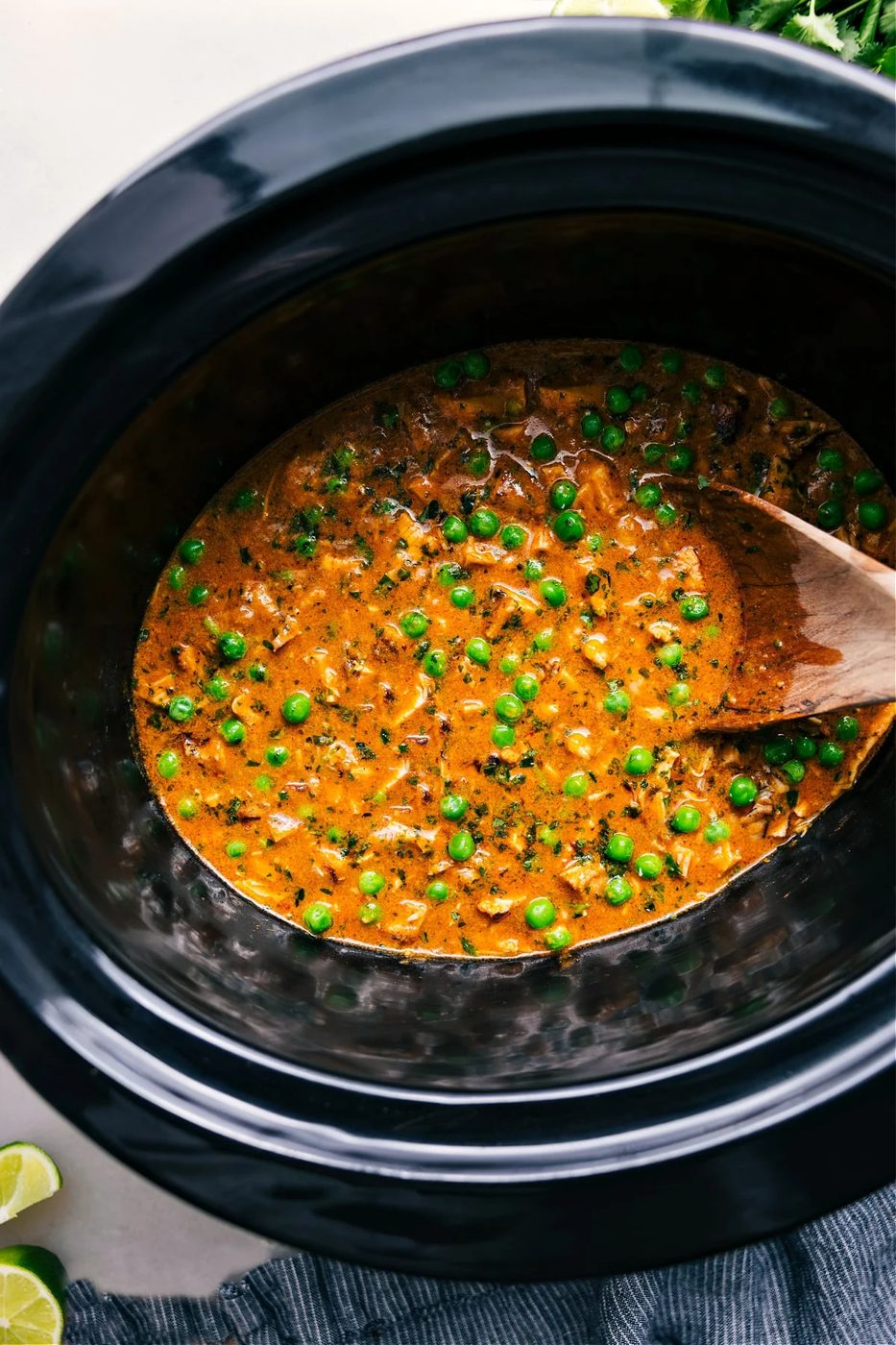 slow cooker Curry Chicken with tender chicken and sweet peas in a creamy coconut curry sauce.
