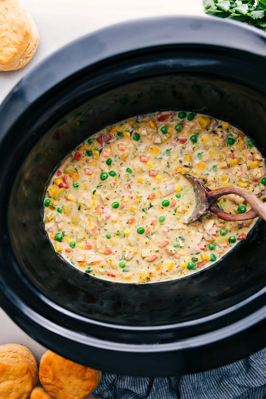 slow cooker chicken recipes featuring creamy chicken pot pie with tender chicken and hearty vegetables.