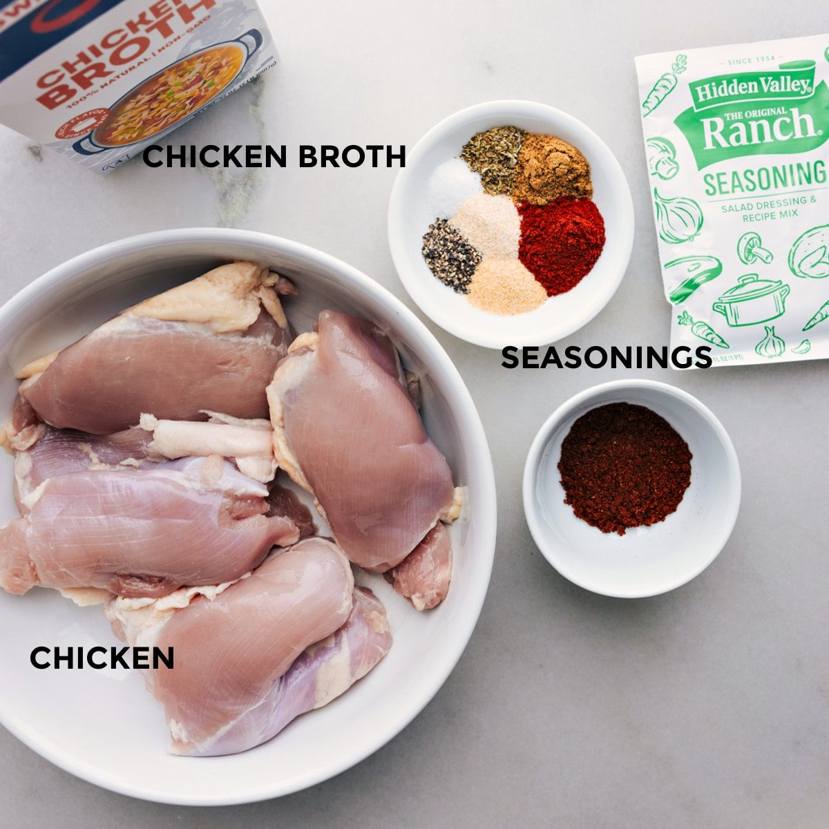 Ingredients for slow cooker Chicken Tacos laid out for straightforward preparation.
