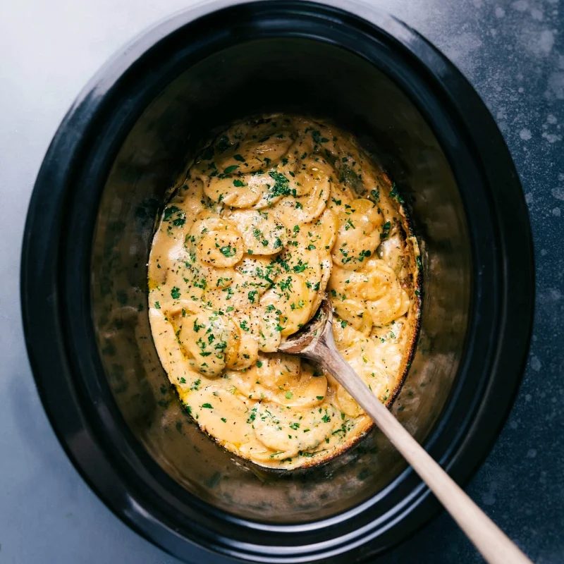Overhead image of the slow cooker Au Gratin Potatoes ready to be enjoyed