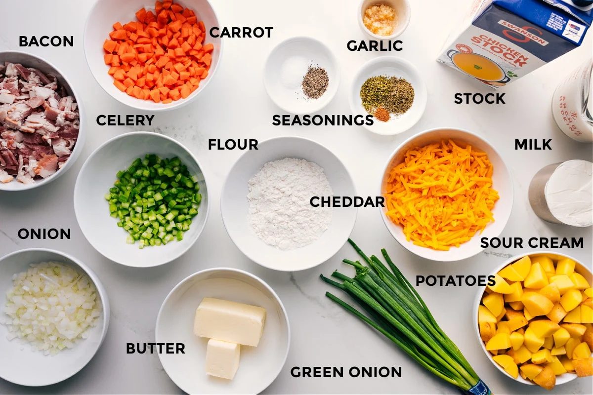 All ingredients for Loaded Potato Soup prepped and ready to assemble, including bacon, onion, carrot, celery, potatoes, seasonings, and cheese.