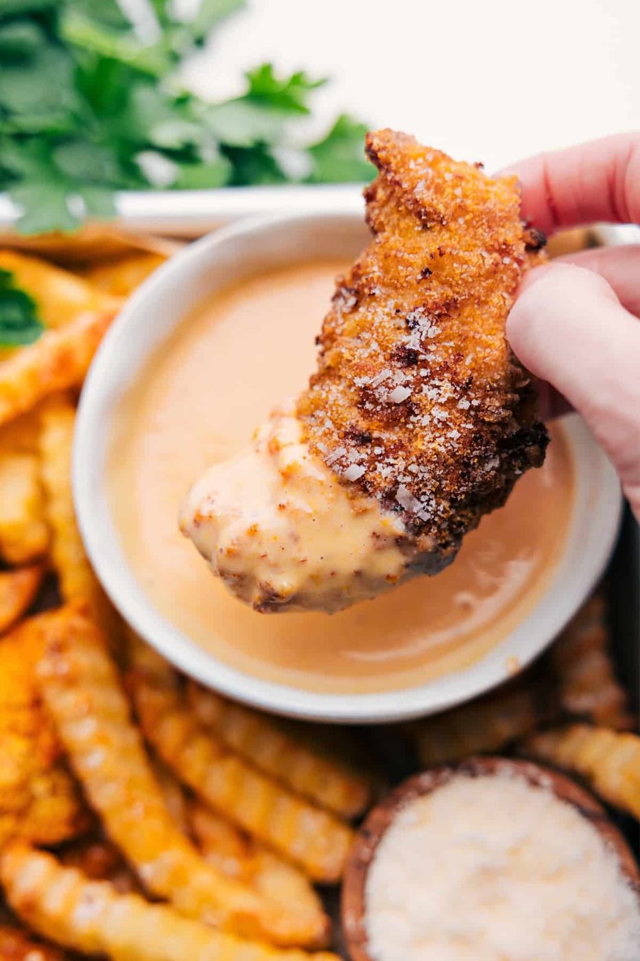 Golden baked chicken tenders with honey mustard make straightforward recipes for kids and busy family dinners.