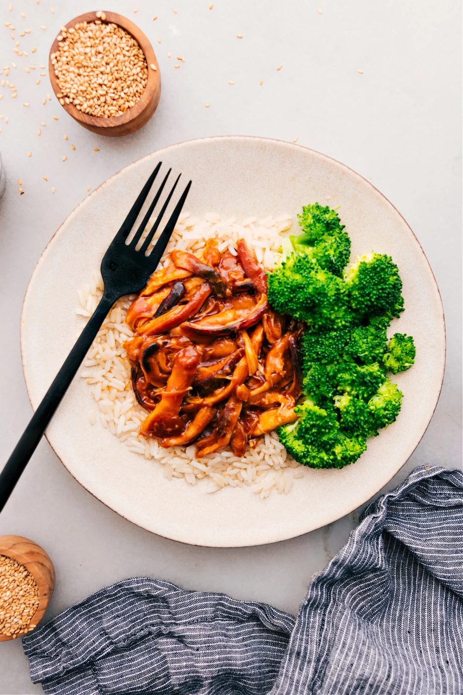 Tender chicken thighs coated in a sticky from-scratch honey garlic sauce.