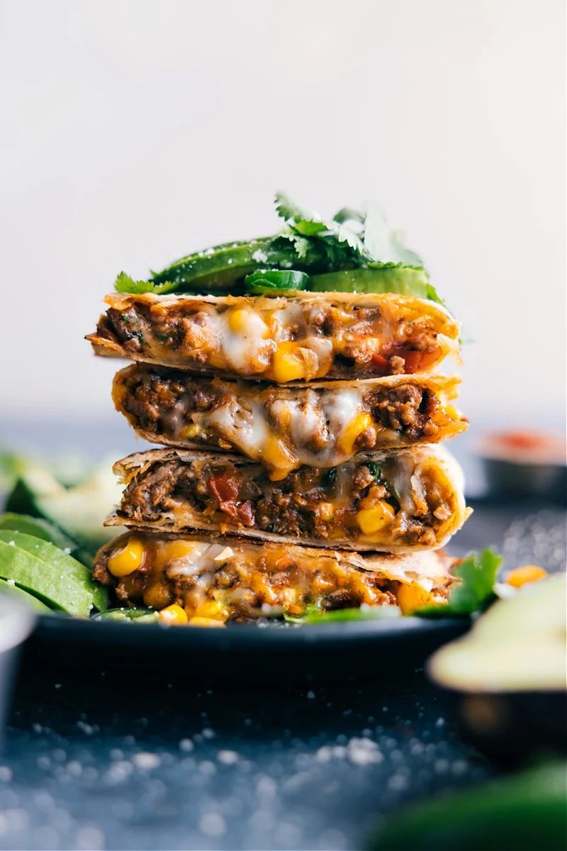 Crispy quesadillas filled with seasoned ground beef, corn, bell pepper, and melted cheese.