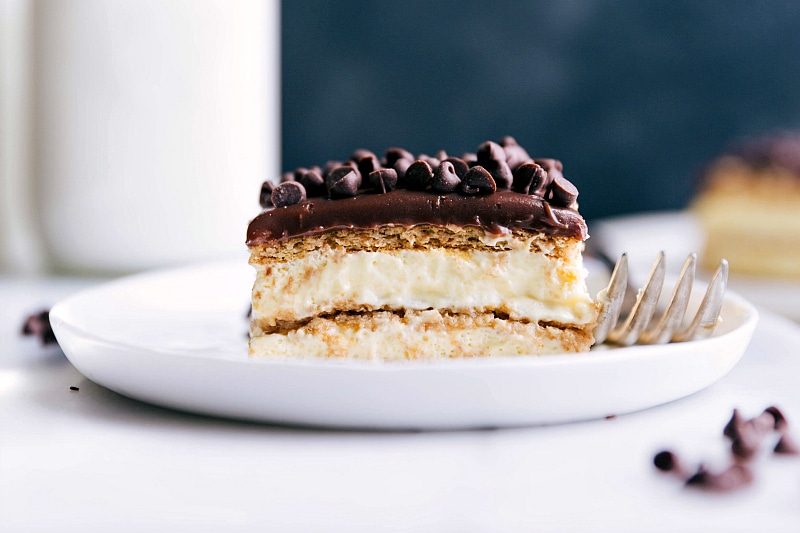 A satisfying and gorgeous slice of chocolate eclair cake ready to be enjoyed.