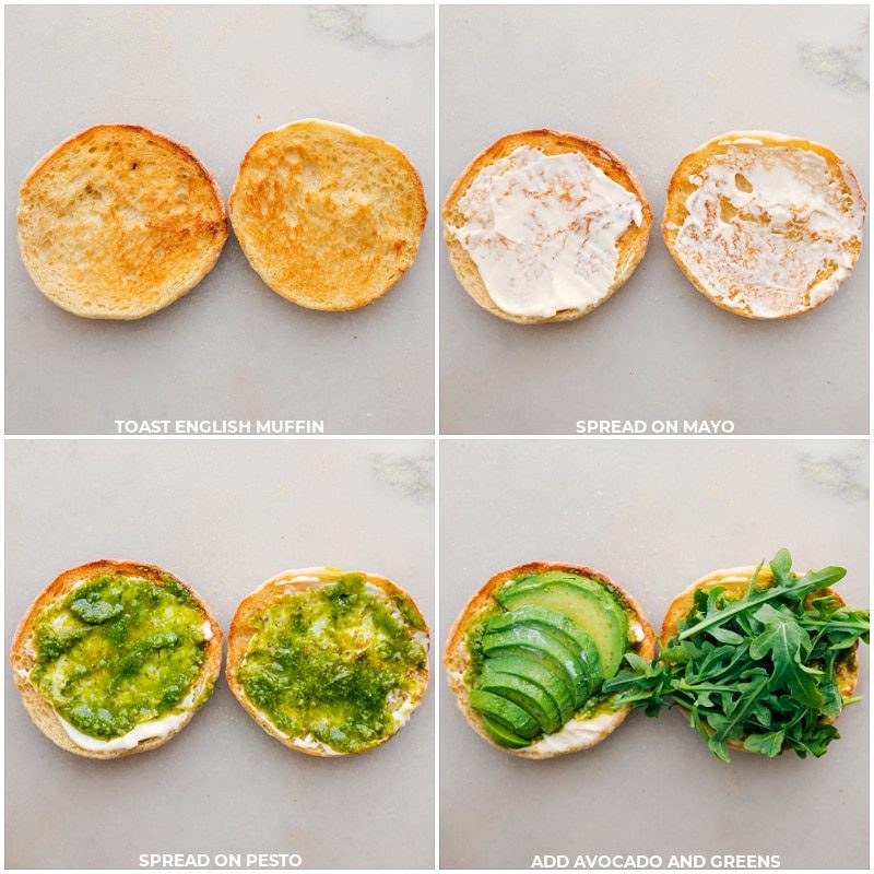 The English muffin sandwich being. toasted then mayo and pesto being spread on the muffins and finally avocado and greens being added on top.