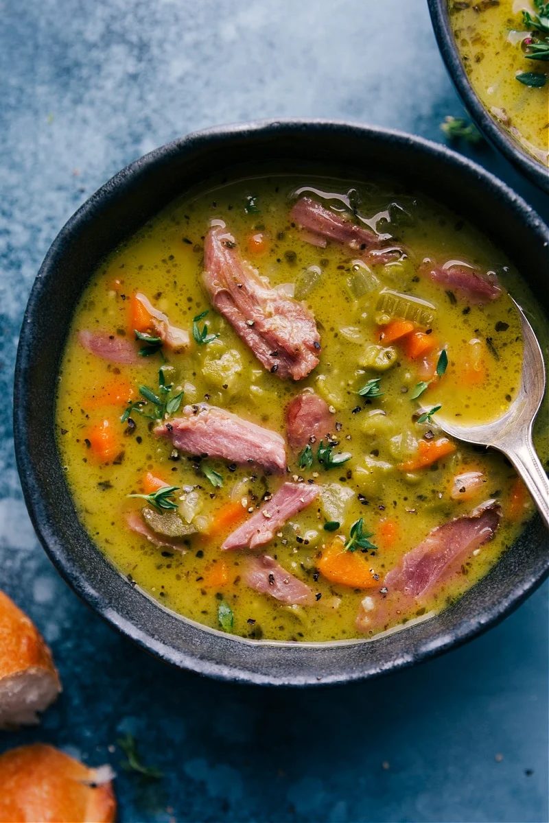 Thick split pea soup with vegetables, split peas, and shredded ham.