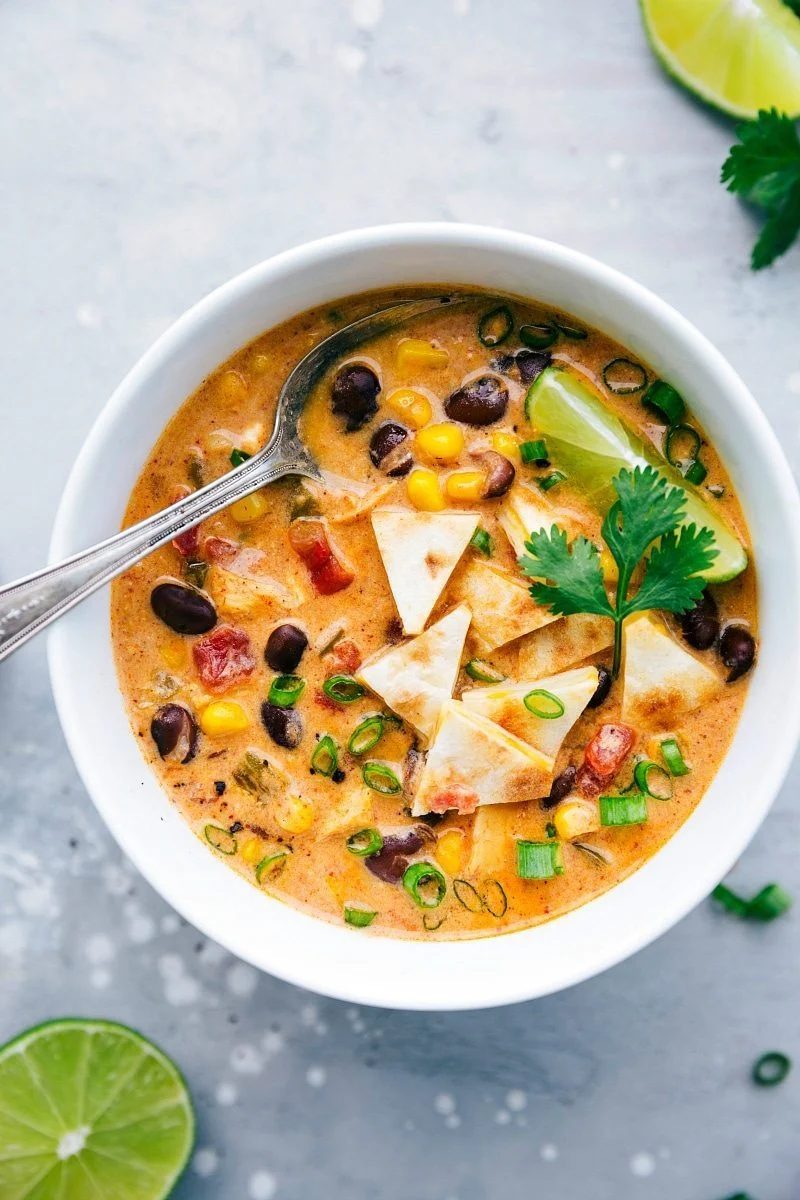 Creamy chicken quesadilla soup topped with crisp cheesy quesadilla croutons.