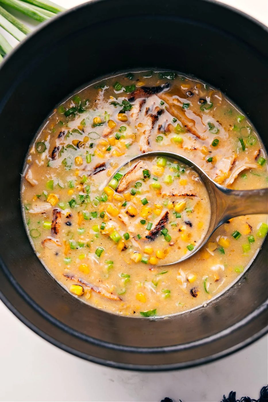 Chicken corn soup with tender chicken, sweet corn, and a savory broth, one of these quick fall soup recipes.