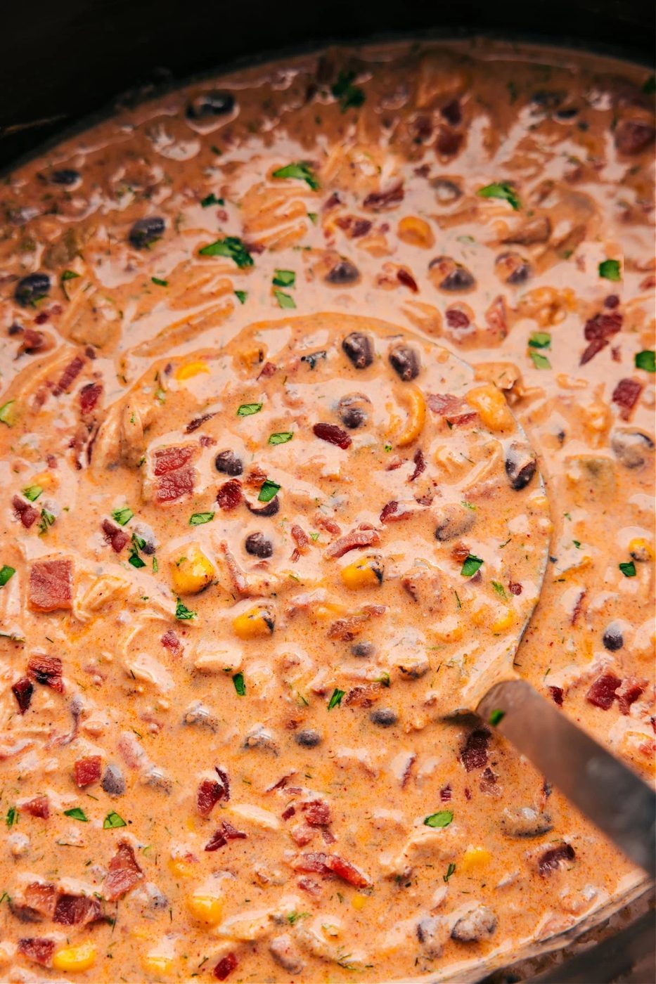 Crack chicken chili with chicken, bacon, ranch seasoning, and a creamy broth, one of these fall soup recipes.