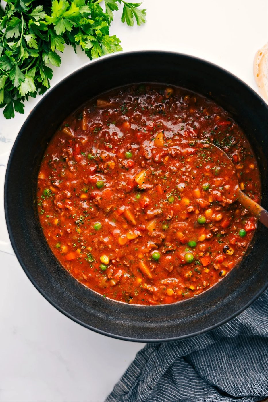 Vegetable beef soup with ground beef, colorful vegetables, and a rich savory broth.