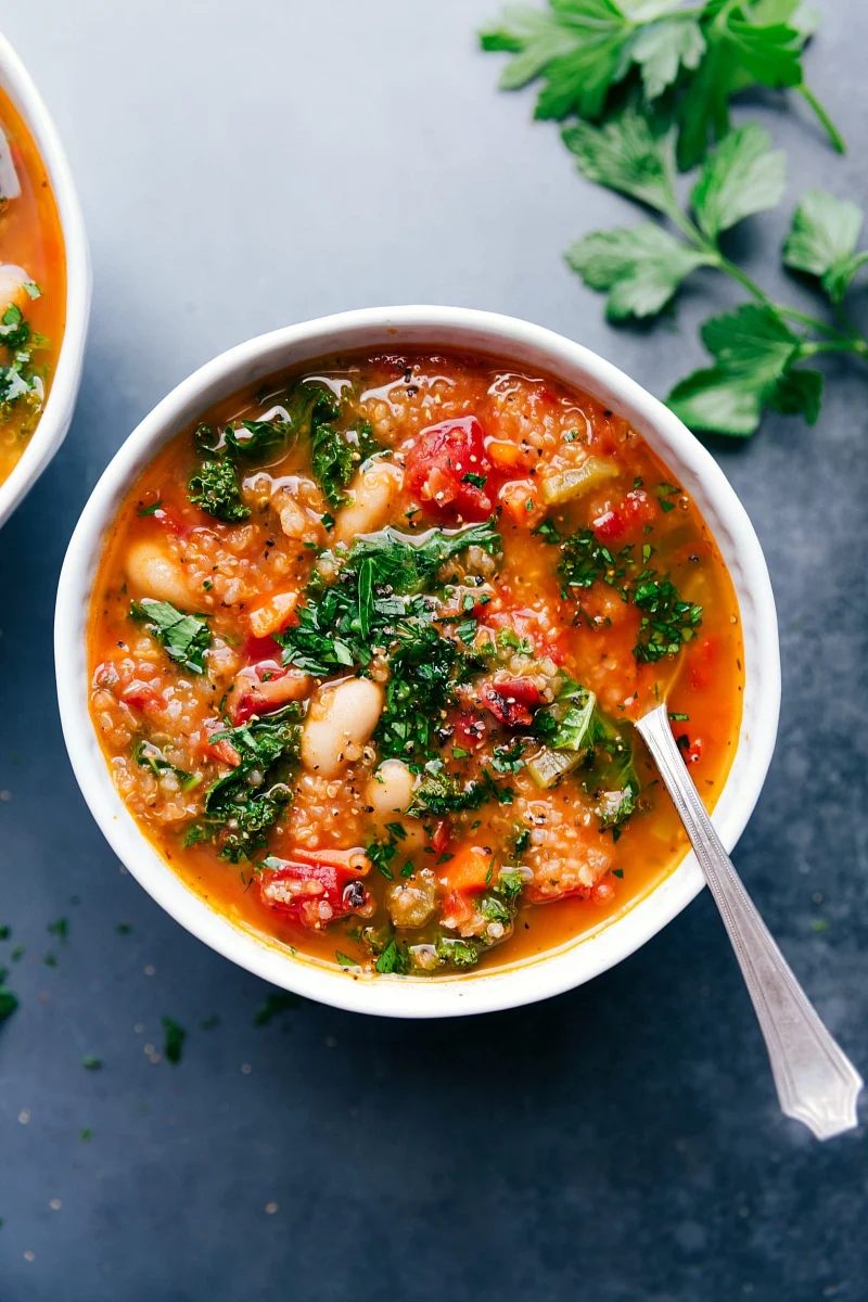 White bean and kale soup with quinoa, tender white beans, and fresh kale.
