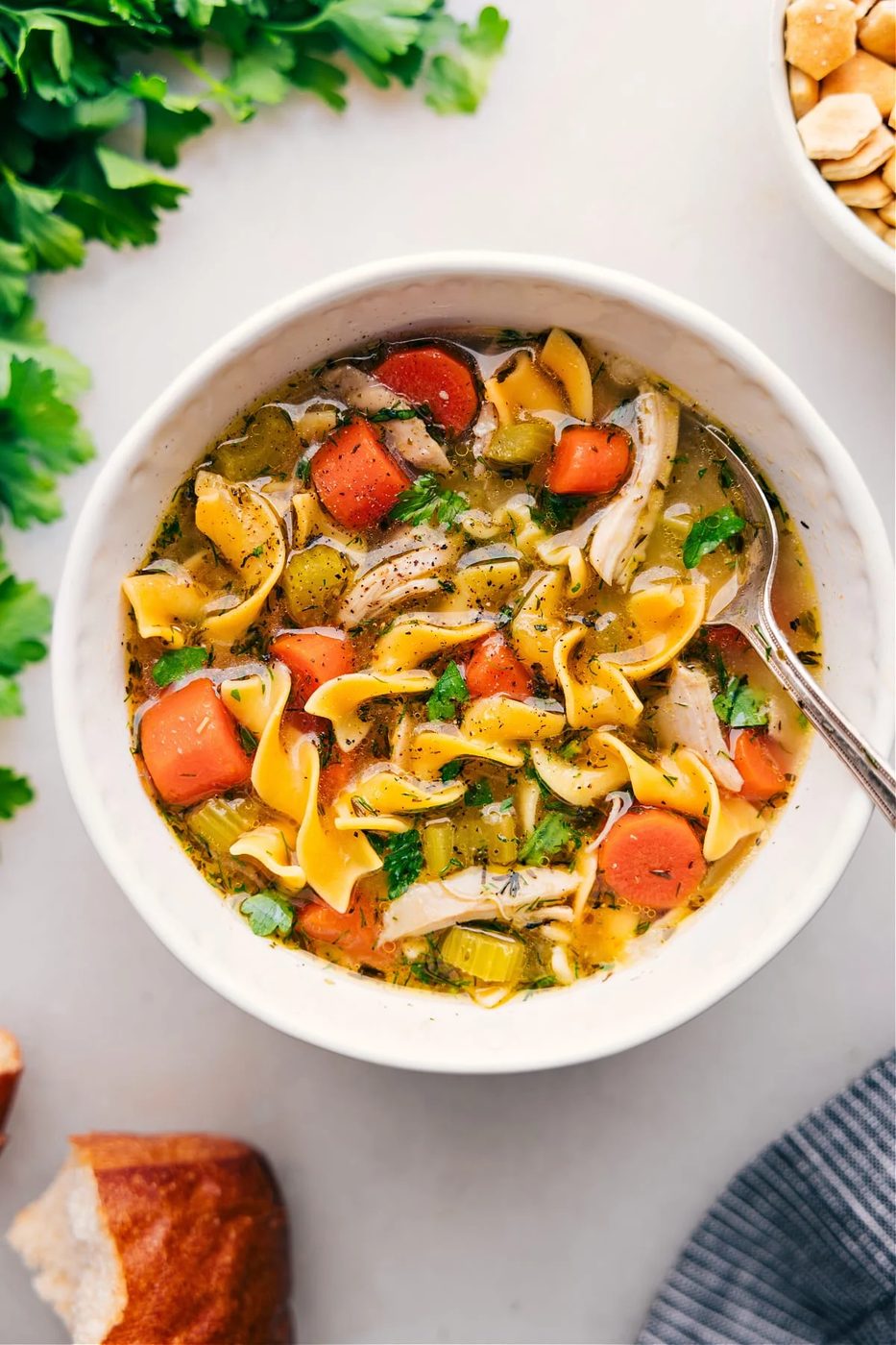 Chicken noodle soup with tender chicken, vegetables, noodles, and rich broth, a classic among fall soup recipes.