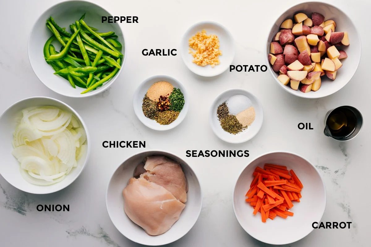 All the ingredients in this recipe are prepped ahead for straightforward assembly, including the onion, pepper, garlic, meat, seasonings, carrot, potatoes, and oil.