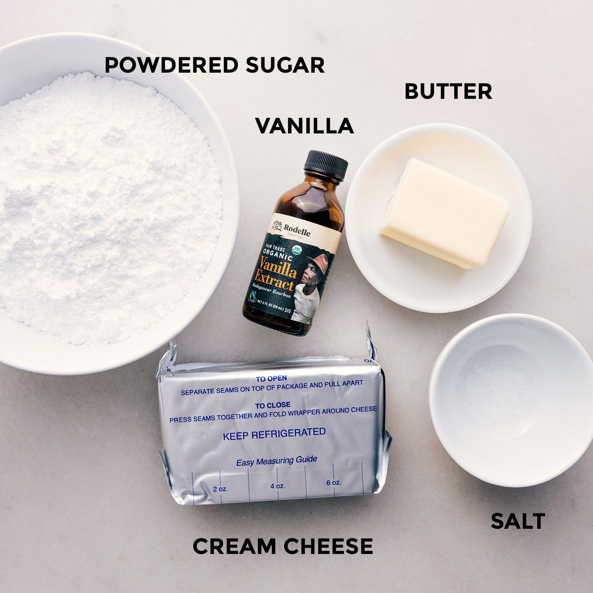 The frosting layer ingredients prepped out for straightforward assembly for this fruit pizza recipe.