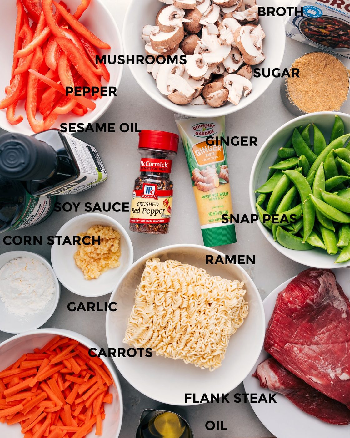 All the ingredients for this recipe, including the veggies, broth, sugar, noodles, cornstarch, garlic, seasonings, and meat, are prepped for straightforward assembly.