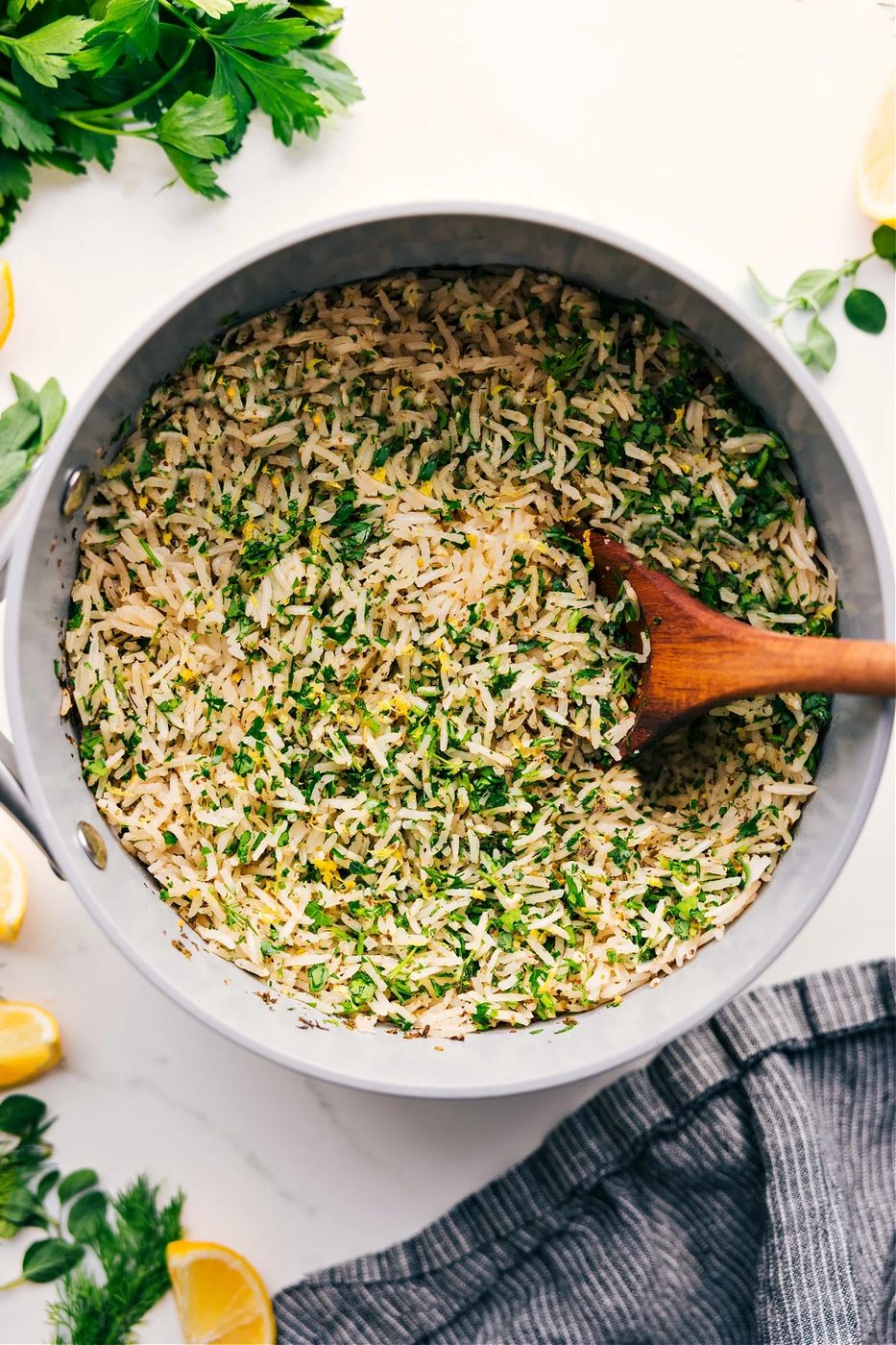 Greek recipes: Greek rice in the pot filled with fresh herbs.