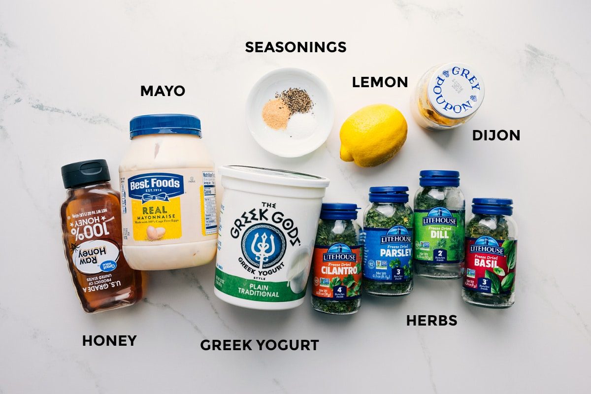 Green Goddess dressing ingredients, all prepped: mayo, honey, Greek yogurt, lemon, Dijon, herbs, and seasonings.