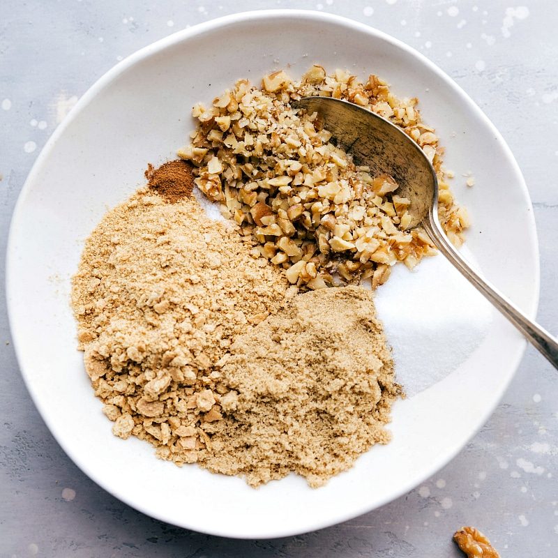 Preparing the brown sugar and walnut topping, a mouthwatering addition to the dessert, adding a sweet and crunchy finish.
