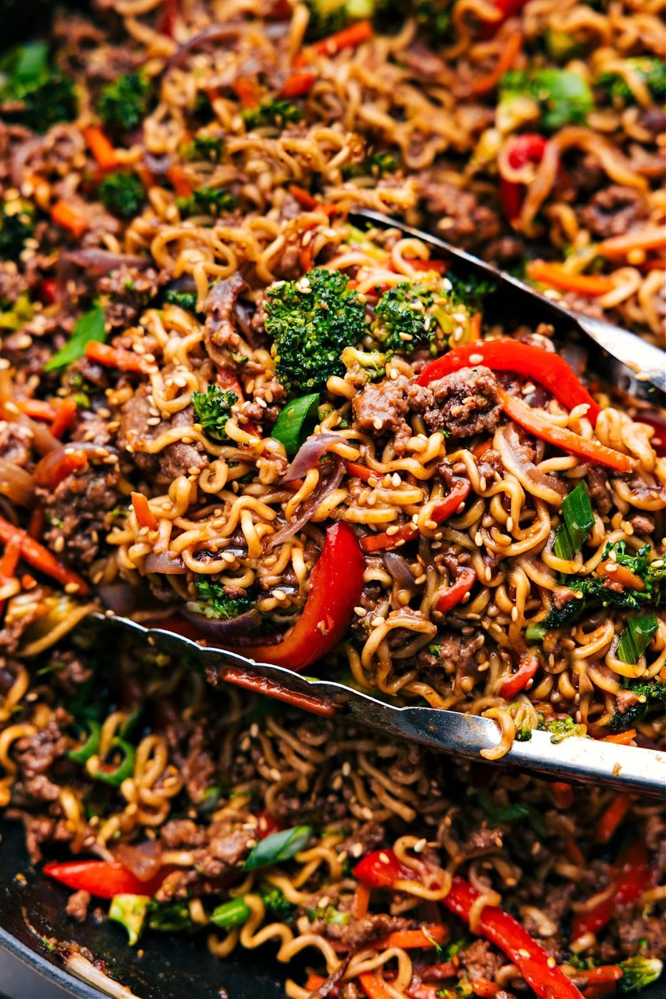 Ground Beef Ramen in the skillet, ready to be served and enjoyed, topped with sesame seeds.
