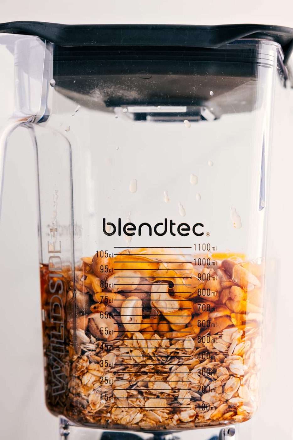 Add all the ingredients for the healthy apple cake to a blender for this straightforward blender cake recipe.