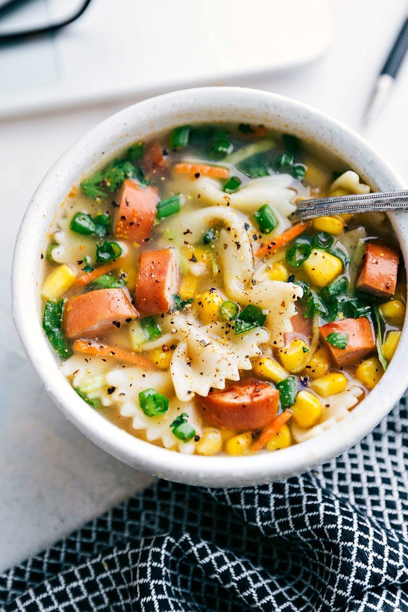 Cajun sausage and noodle soup in a bowl ready to be enjoyed.