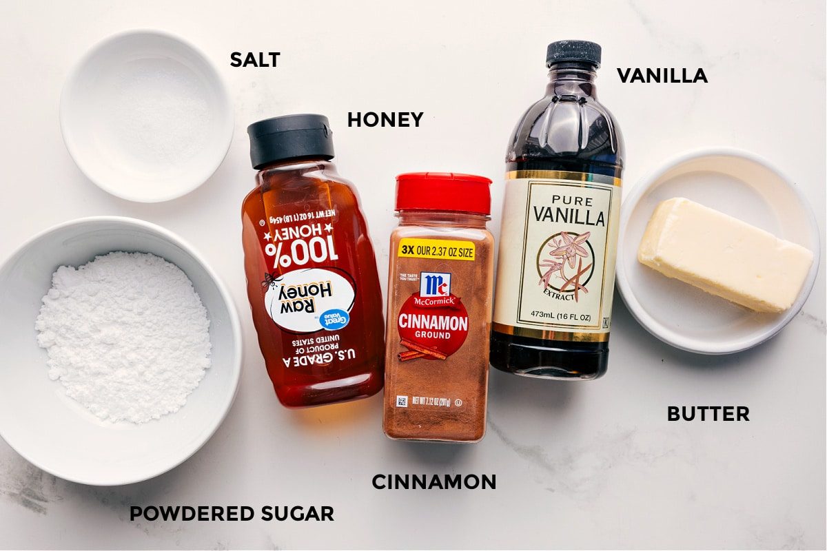 All the ingredients in this recipe prepped out for straightforward assembly including the powdered sugar, honey, cinnamon, vanilla, and butter.