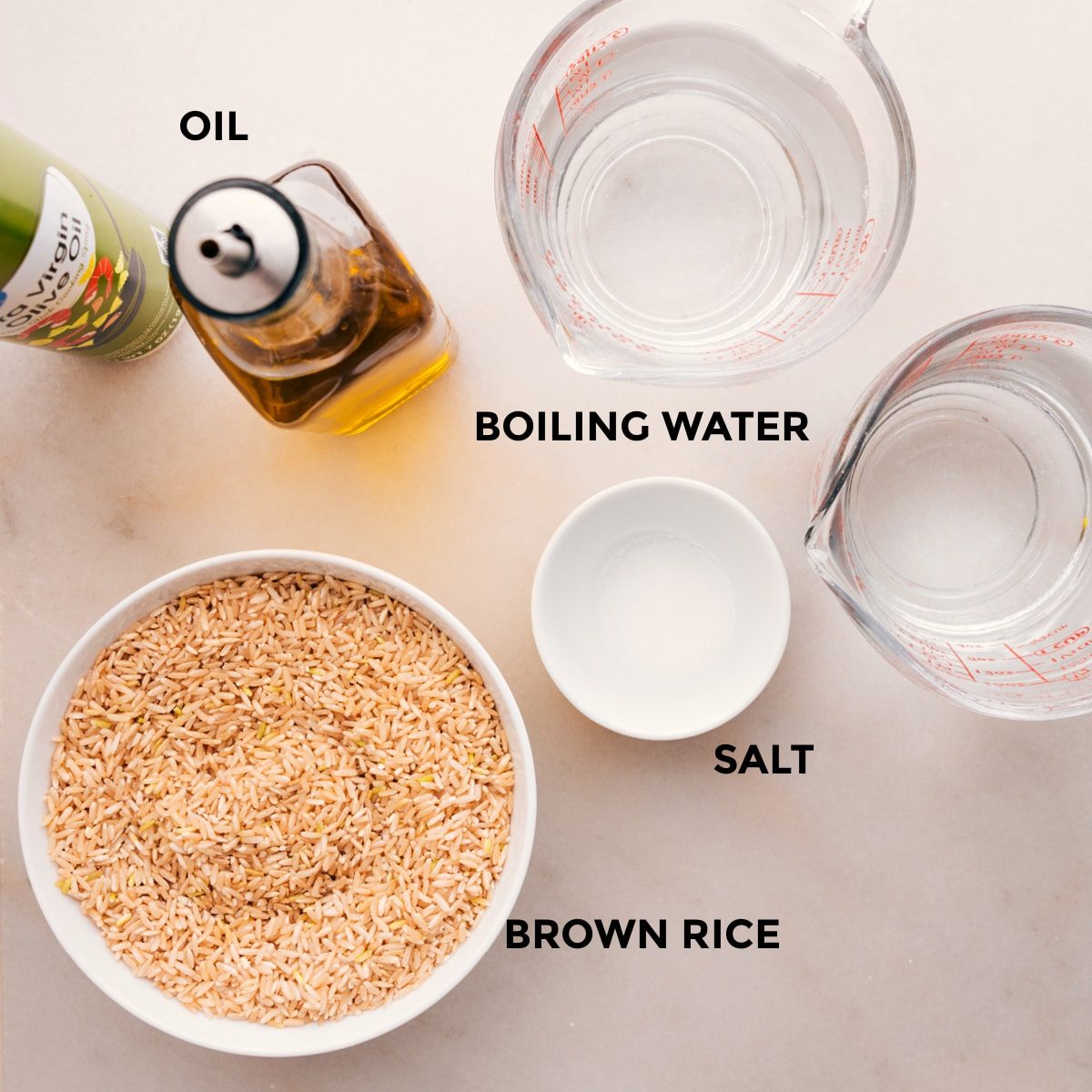 Ingredients in this recipe are ready for straightforward assembly: rice, salt, boiling water, and oil.