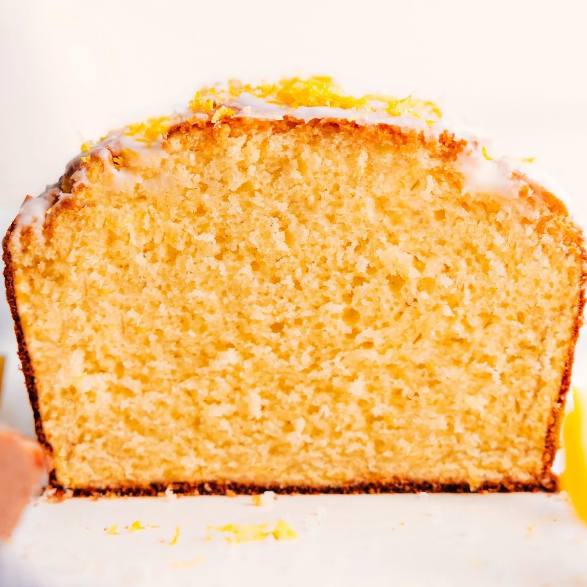 Lemon bread recipe freshly cut open, showing the soft texture inside.