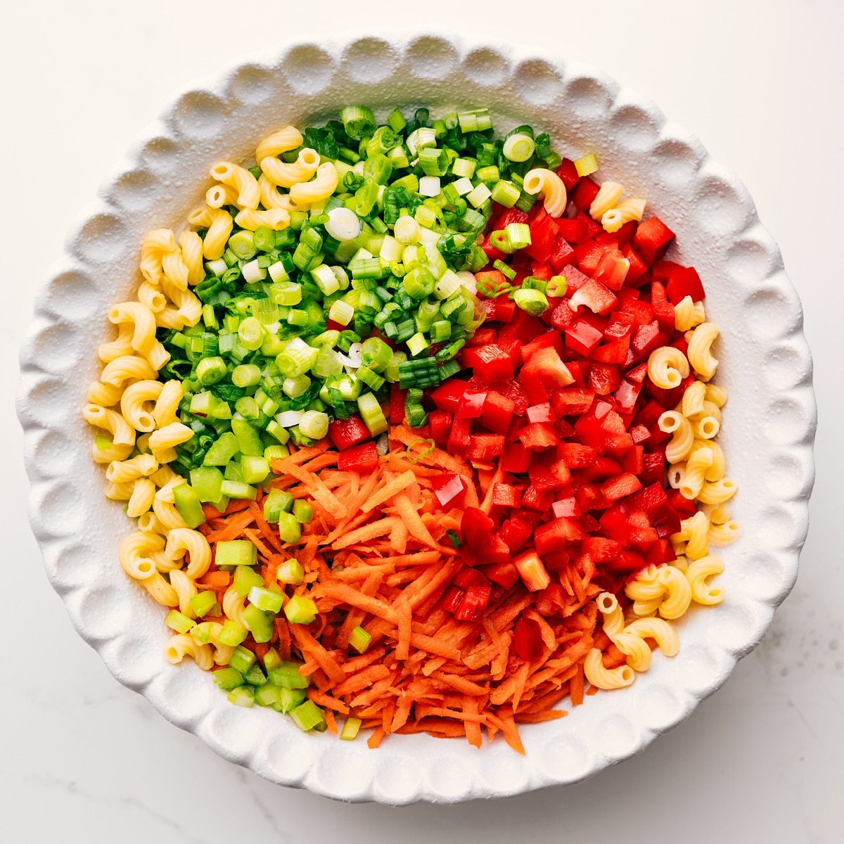 All the ingredients added to a large bowl not mixed together yet.